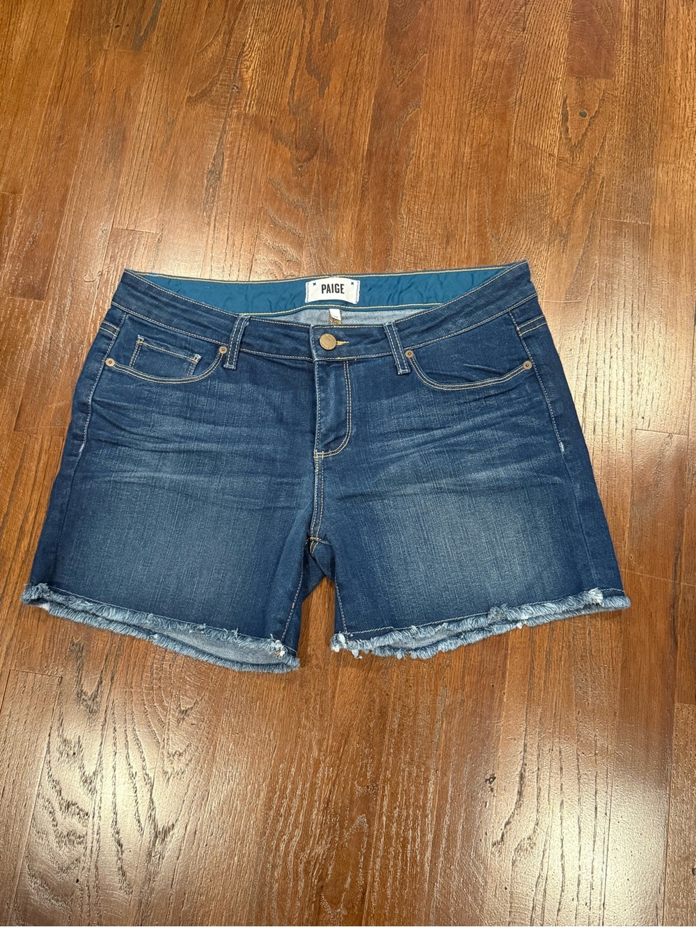 PAIGE Indigo Frayed Hem Denim Shorts